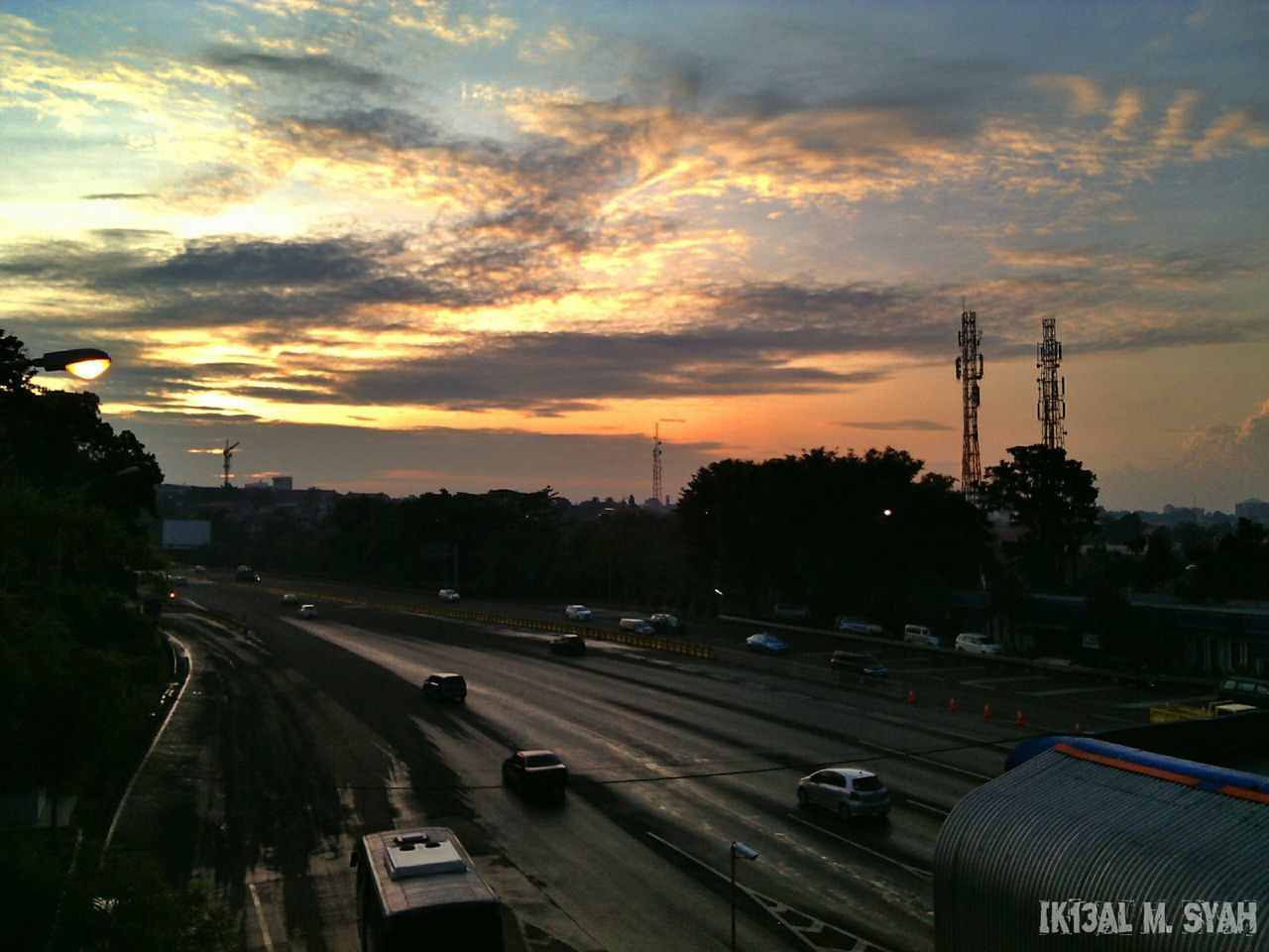 VIEW OF ROAD AT SUNSET