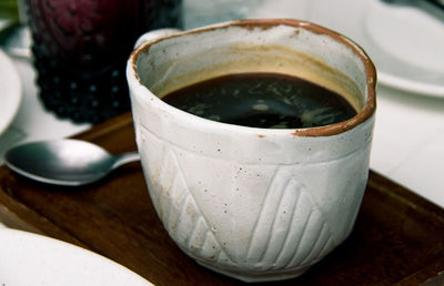 High angle view of coffee cup on table