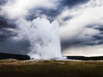Scenic view of clouds over landscape against cloudy sky