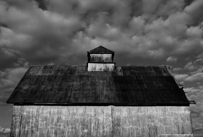 Low angle view of roof against sky