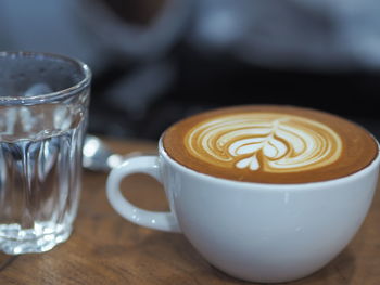 Close-up of cappuccino on table