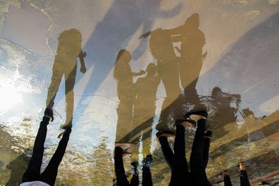 Reflection of people on water