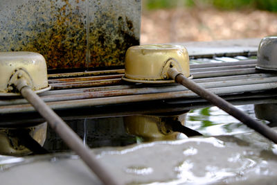 Ladles over water at shrine