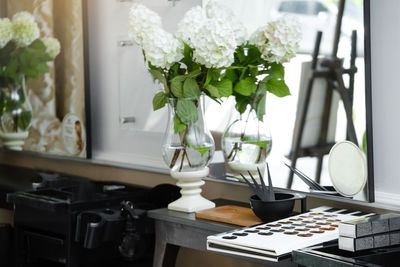 Beauty salon interior with flowers. hairdressing procedures in luxe beauty salon, free space. mirror