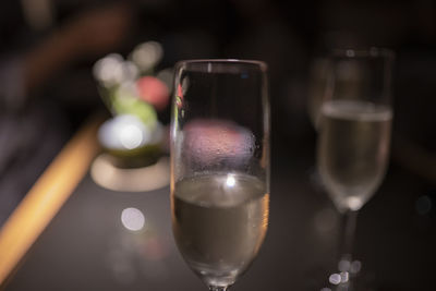 Close-up of wine glass on table