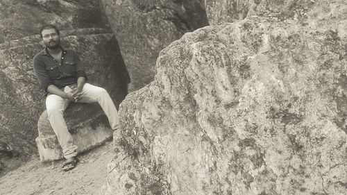 Woman standing on rock