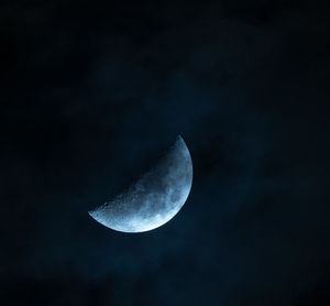 Low angle view of moon against sky at night