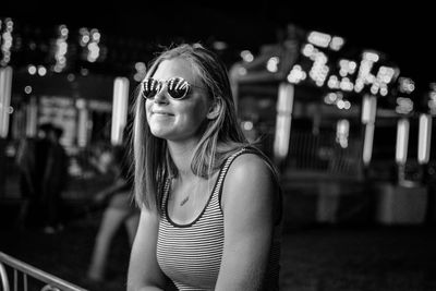 Portrait of young woman in sunglasses