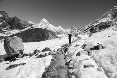 Scenic view of snow covered mountains