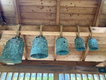 Clothes hanging on wooden wall