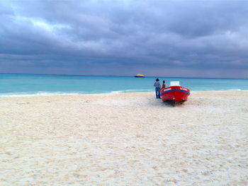 Scenic view of sea against cloudy sky