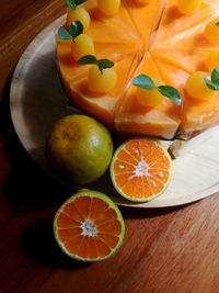 Homemade orange yogurt cake with fresh orange halves