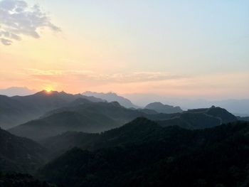 Scenic view of mountains at sunset