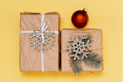 Directly above shot of christmas decorations on red background