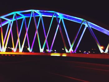 Low angle view of light trails at night