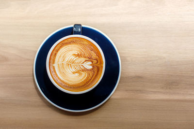 Directly above shot of cappuccino on table