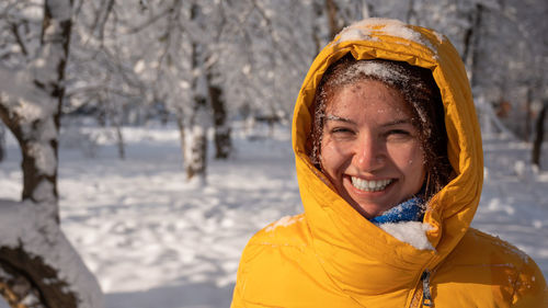 Portrait of young woman wearing warm clothing