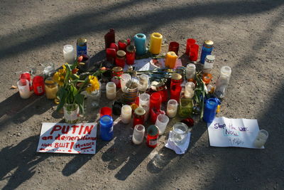 High angle view of bottles on street