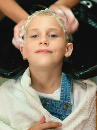 Portrait of boy looking at camera