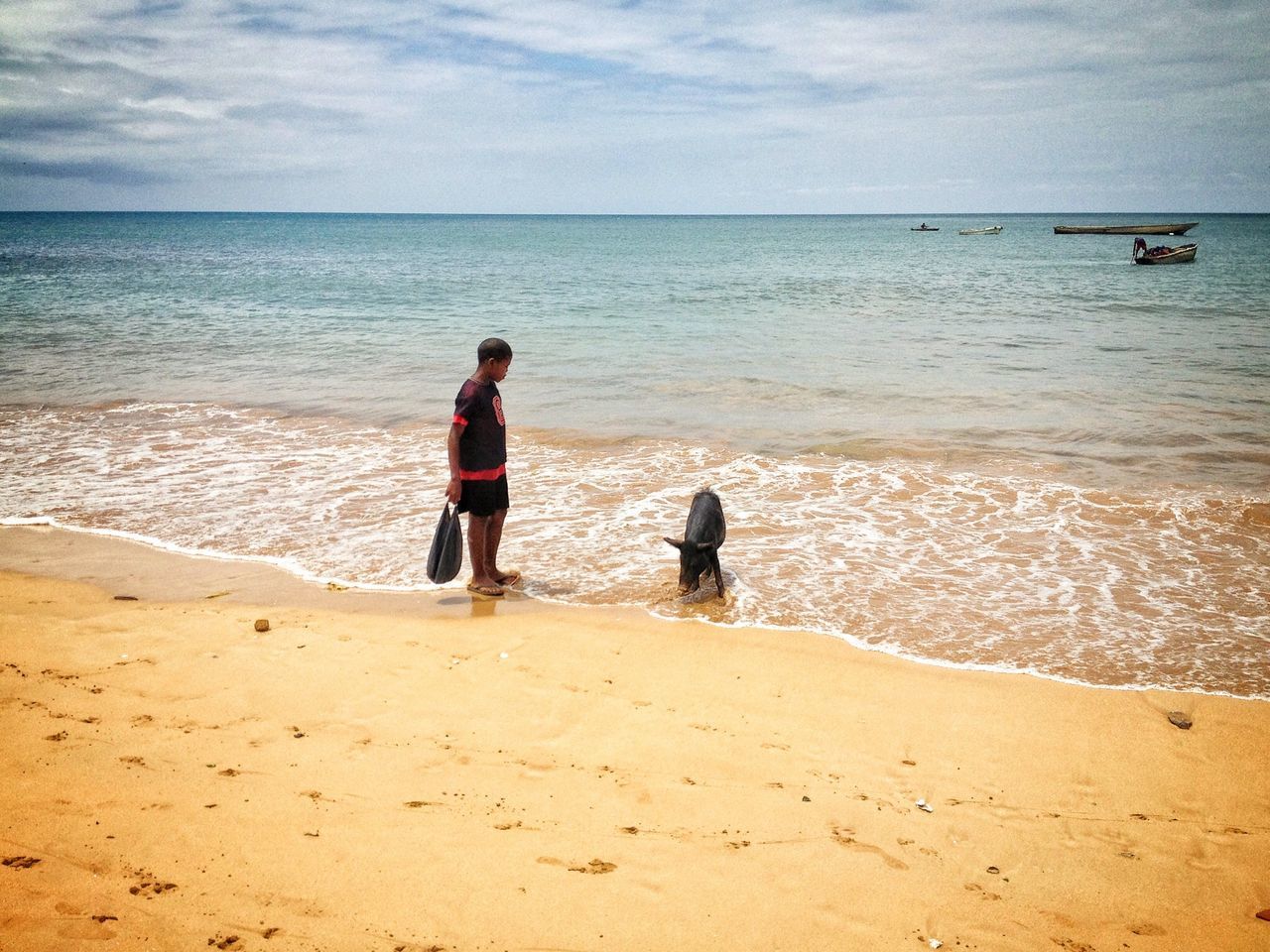 sea, beach, water, horizon over water, sand, shore, full length, leisure activity, lifestyles, vacations, sky, rear view, childhood, togetherness, tranquility, beauty in nature, boys, scenics