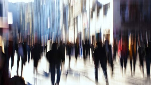 Group of people walking in store