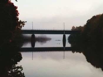 Reflection of trees in calm lake