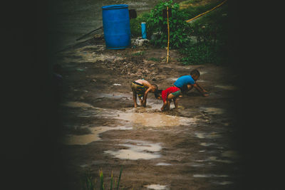 High angle view of people walking on footpath