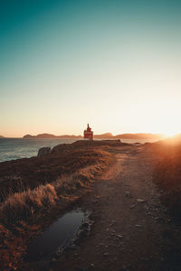 View of sea against clear sky during sunset