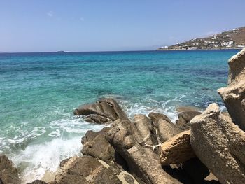 Scenic view of sea against clear blue sky