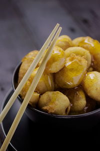 Close-up of chineese deep-fried bananas in bowl