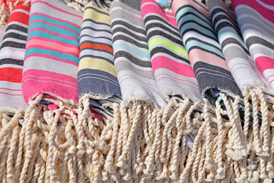 Close-up of textiles for sale in store