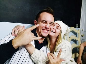 Portrait of happy young couple