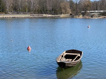 High angle view of sailboat moored in lake