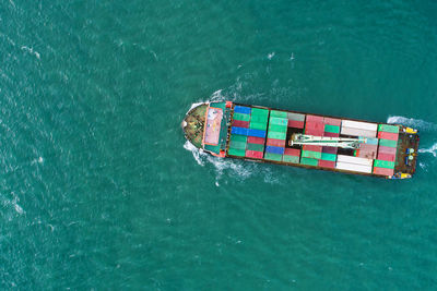 High angle view of boat floating on sea