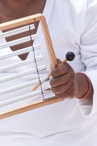 High angle view of man holding umbrella