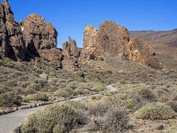 Trail around the rock formations at roques de garcia, teide national park , tenerife, canary islands