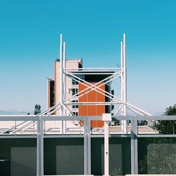 Low angle view of built structure against clear blue sky