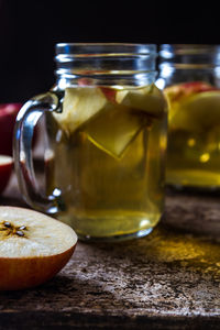 Close-up of drink in glass jar on table