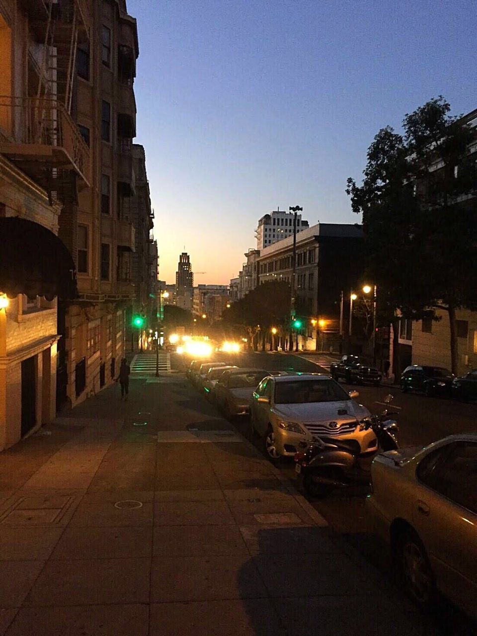 CARS ON CITY STREET AT NIGHT