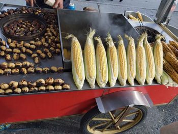 High angle view of food on barbecue grill corn and oak by the coast of istanbul