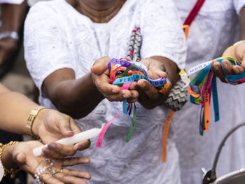 Faithful celebrate the last friday of the year at senhor do bonfim church.