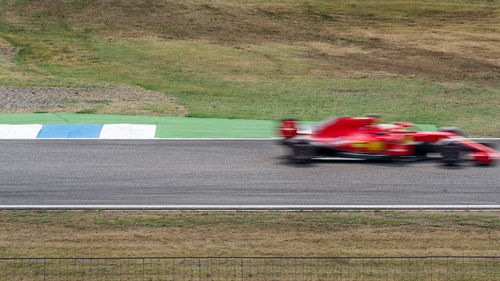 Blurred motion of car on road