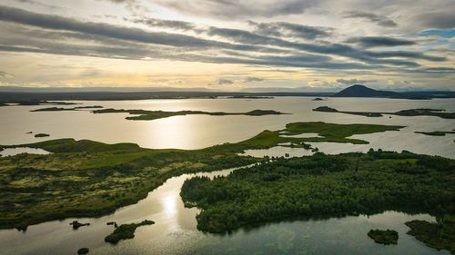 Scenic view of lake against sky during sunset