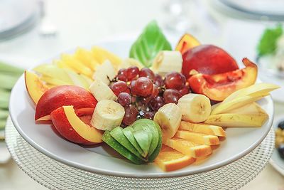 Close-up of fruit salad in plate on table