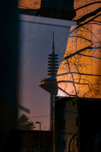 Low angle view of building against sky during sunset