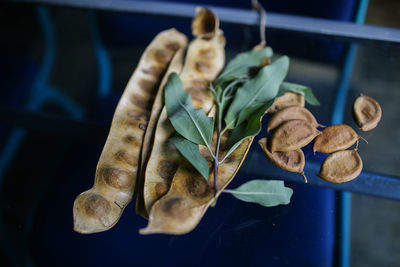 Close-up of dried leaves on table