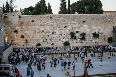 Group of people in front of historical building