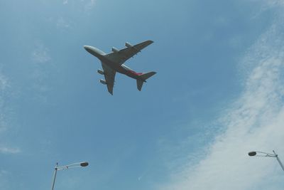 Low angle view of vapor trails in sky