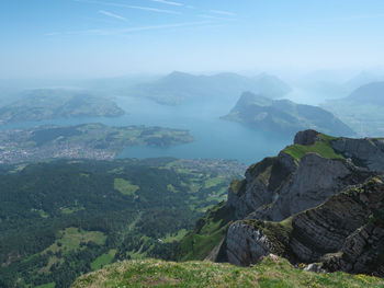 Scenic view of landscape and mountains against sky