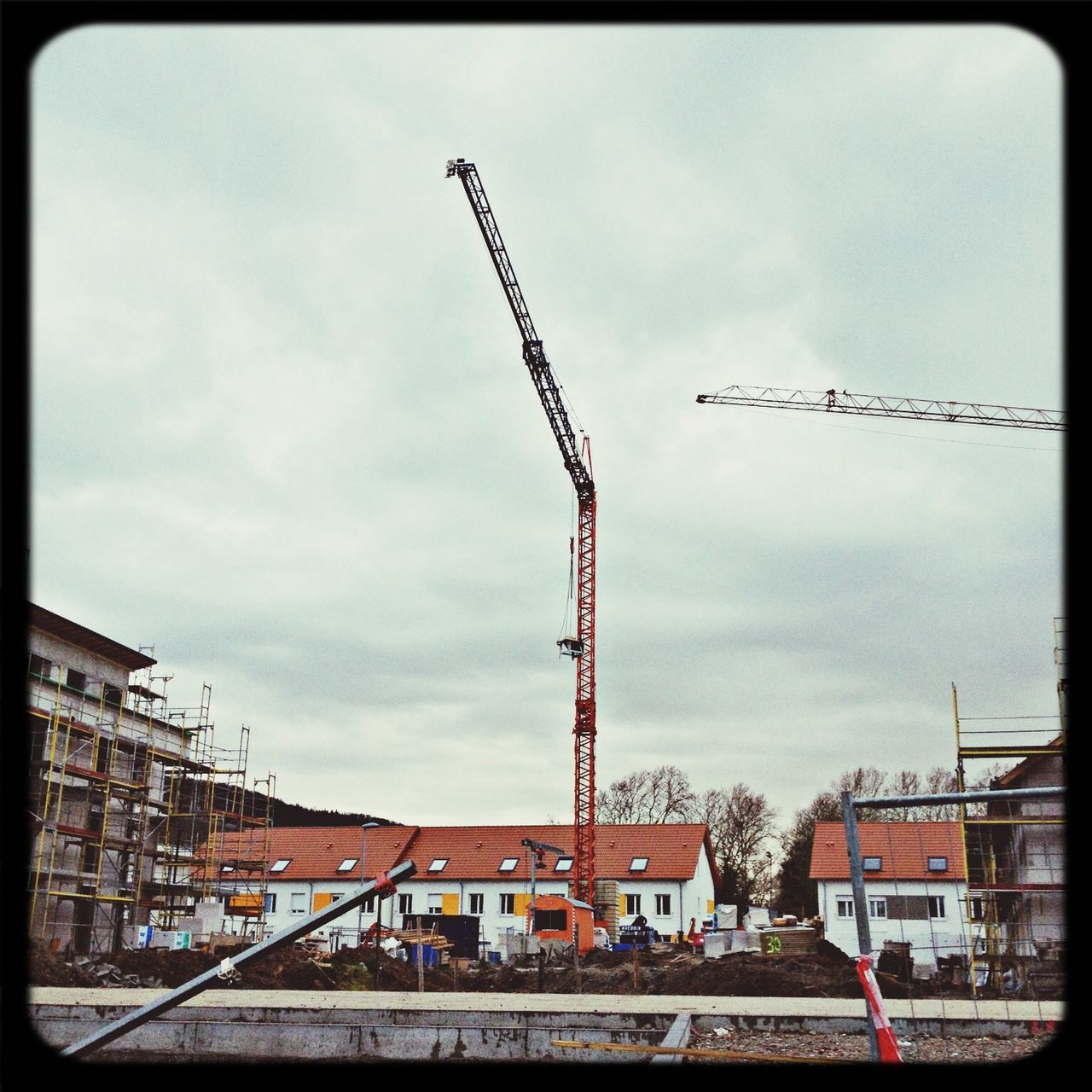 building exterior, architecture, built structure, construction site, crane - construction machinery, sky, development, crane, construction, construction industry, industry, incomplete, transfer print, city, auto post production filter, cloud - sky, factory, day, fuel and power generation, cloud